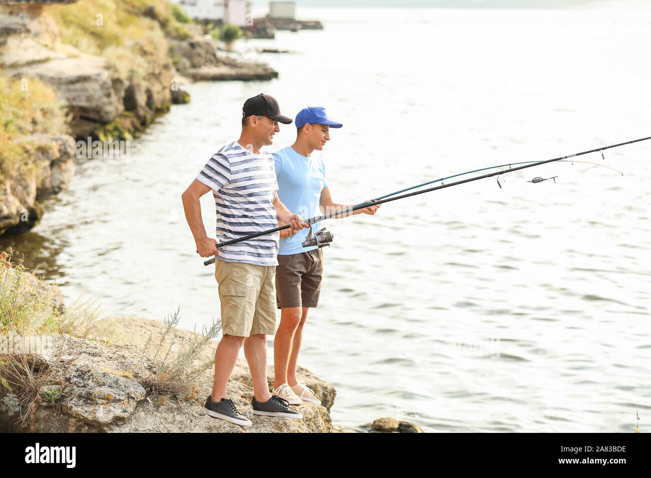 Young adult fishing hi-res stock photography and images - Page 29