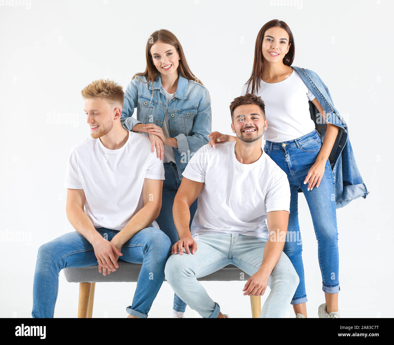 Group of young people in stylish casual clothes on white background ...
