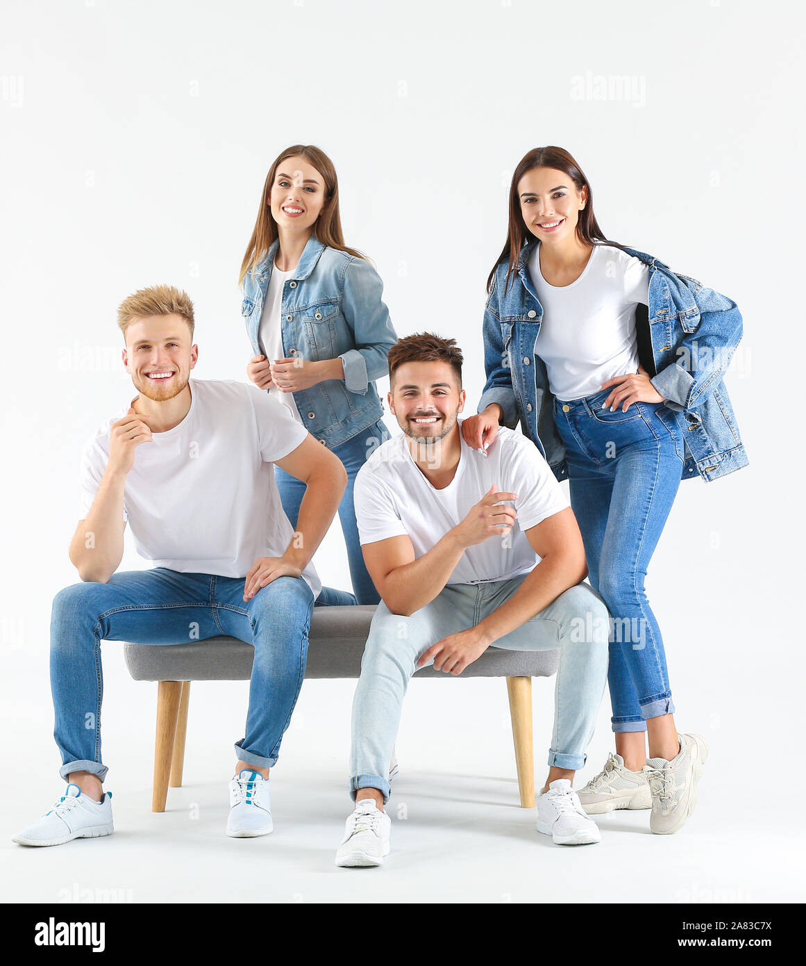 Group of young people in stylish casual clothes on white background ...