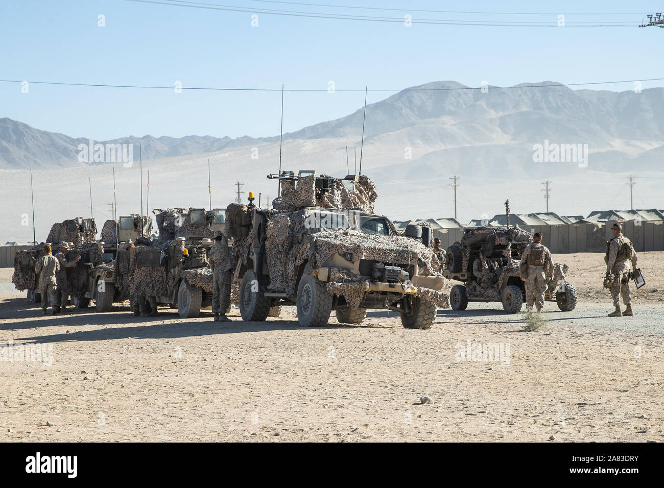 U.S. Marines with 1st Battalion, 6th Marine Regiment, 2nd Marine Division (2d MARDIV) prepare to depart for the field from Camp Wilson, Marine Corps Air Ground Combat Center, Twentynine Palms California, Nov. 3, 2019. Marines with 6th Marines are providing ground support during MAGTF Warfighting Exercise 1-20, the largest exercise conducted by the 2d MARDIV in decades. (U.S. Marine Corps photo by Lance Cpl. Reine Whitaker) Stock Photo