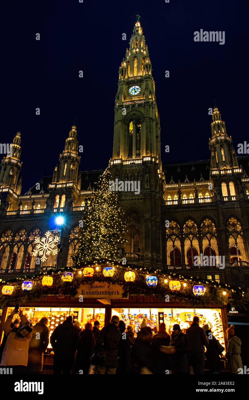 VIENNA, AUSTRIA, DEC 20 2018, The illuminated shop at traditional Christmas market in front of Rathaus - City hall at Vienna, Austria. Stock Photo