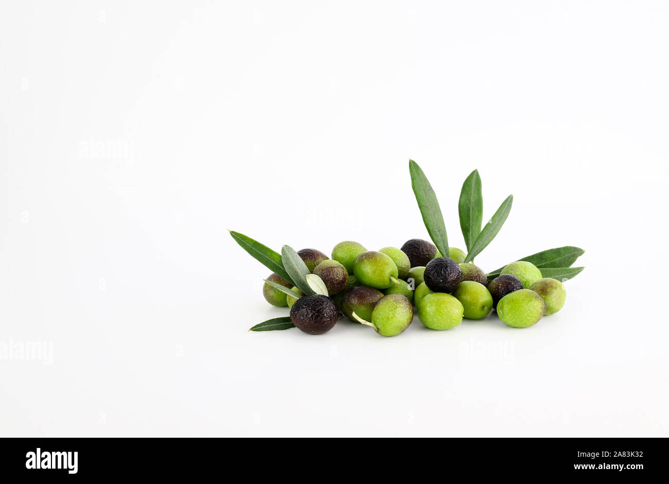 Fresh olives green with leaves isolated on white background Stock Photo ...