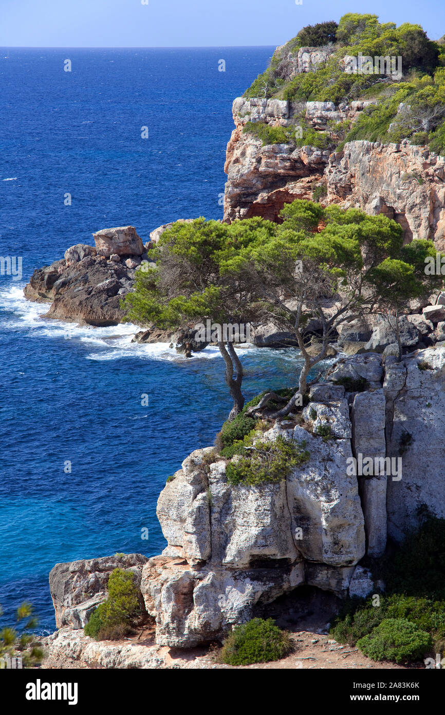 Rocky coastline at Cala de s'Almonia, Cala Llombards, Santanyí, Mallorca, Balearic islands, Spain Stock Photo