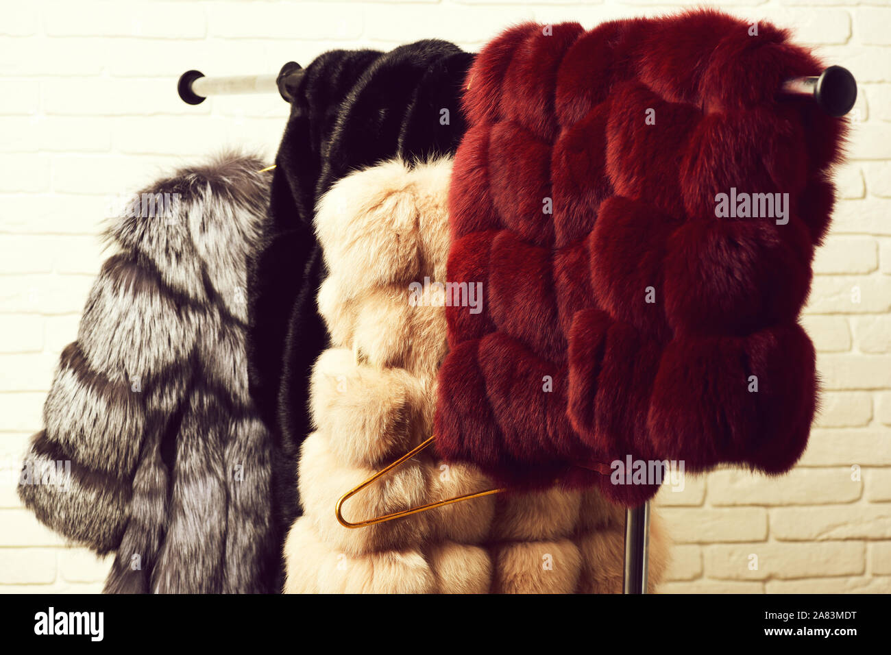 Expensive fur coat hanging hires stock photography and images Alamy
