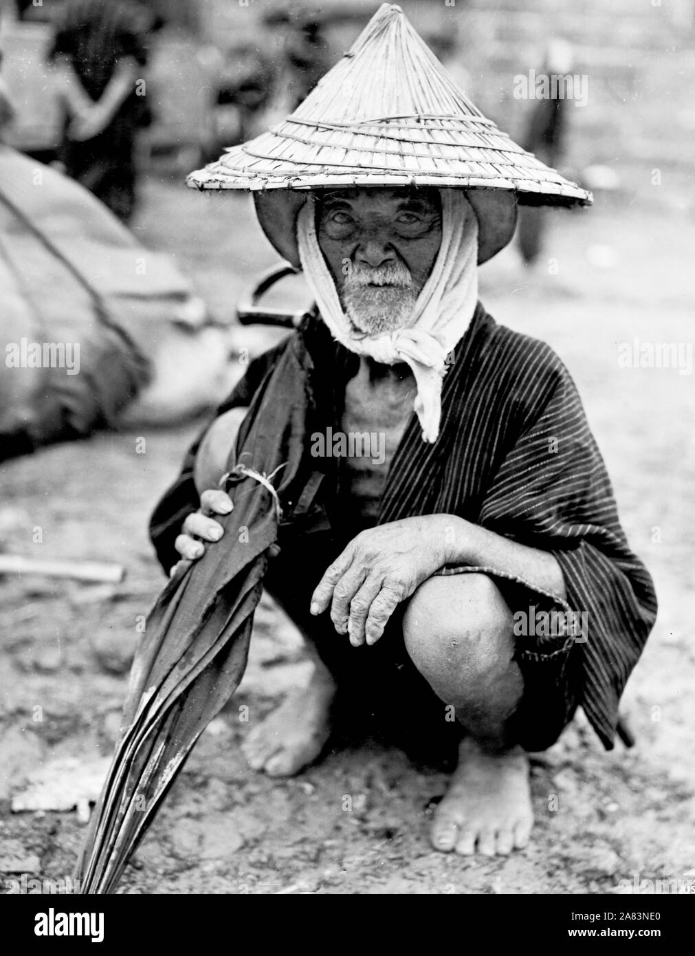 One of the oldest Okinawa natives taken care of by Marines during their invasion of Okinawa Stock Photo