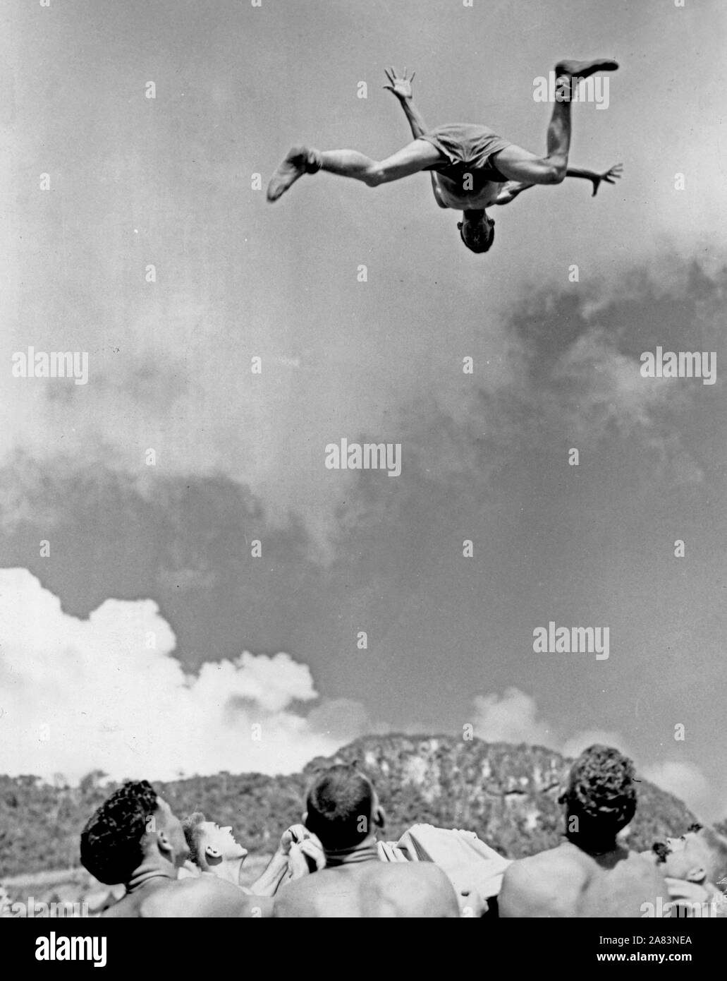 Marines on Okinawa (after the fighting) use a blanket for entertainment - launching fellow Marines high in the air Stock Photo