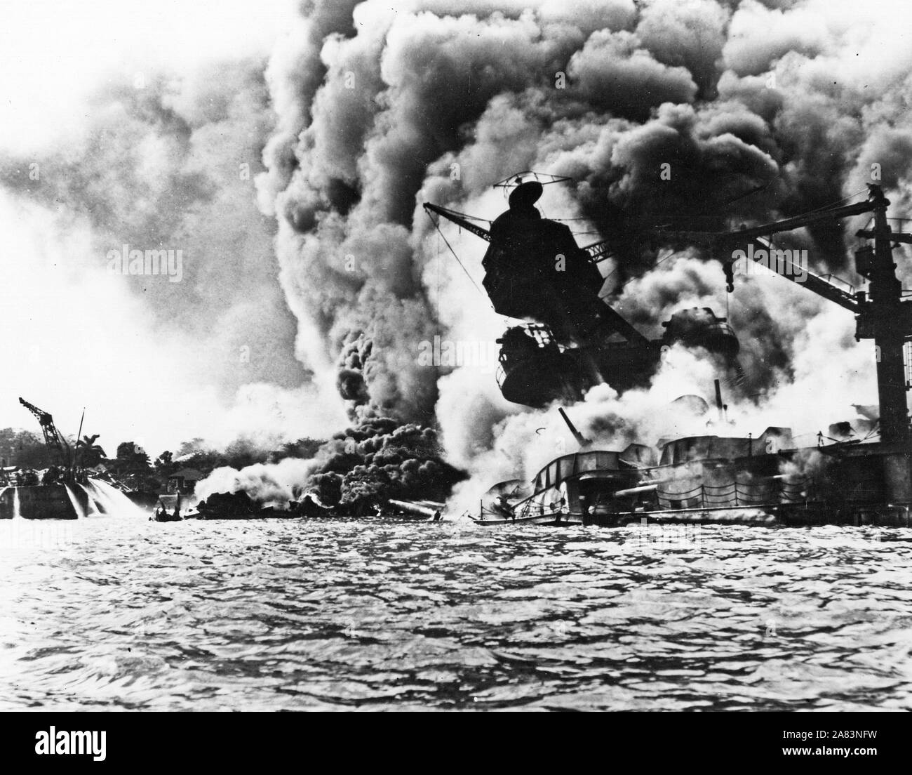 The USSArizona (BB39) burning after the Japanese attack on Pearl Harbor, Dec. 7 1941 Stock Photo