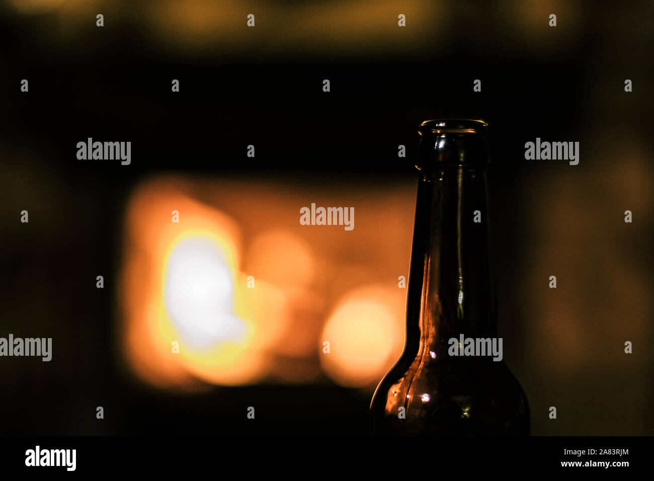 Beer Bottle Transparent Glass Dark Silhouette On A Fire Pit Blurry