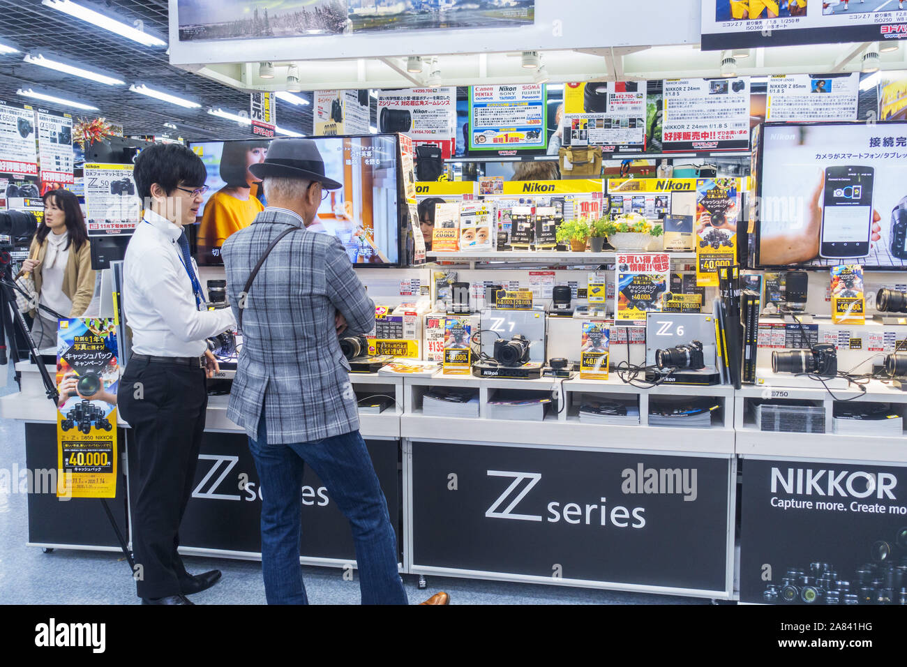 Osaka, Japan - November 3rd, 2019: Customers inside Yodobashi camera equipment and electronics store. Stock Photo