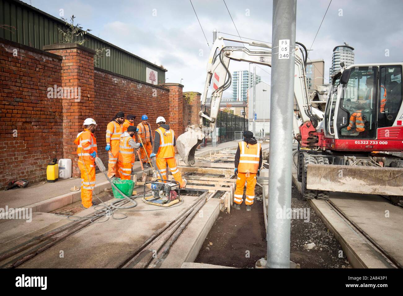 Last concrete pour on the track of the Trafford Park Metrolink Line, Stock Photo