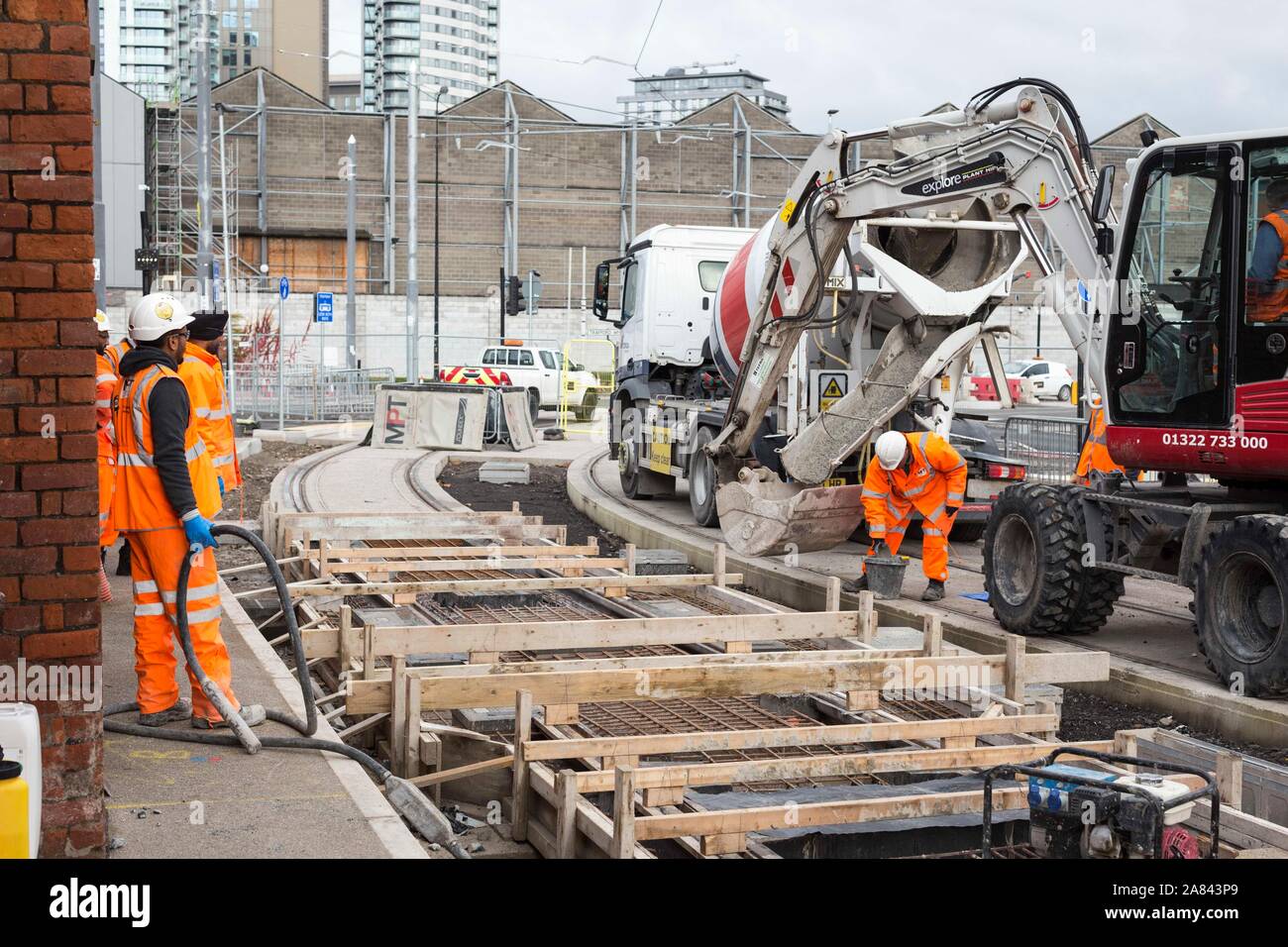 Last concrete pour on the track of the Trafford Park Metrolink Line, Stock Photo