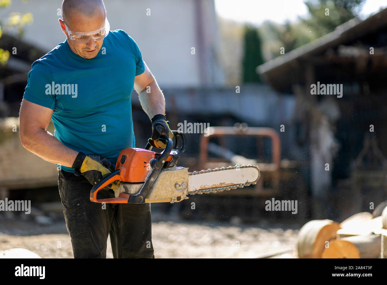 Muscular man holding chain hi-res stock photography and images - Alamy