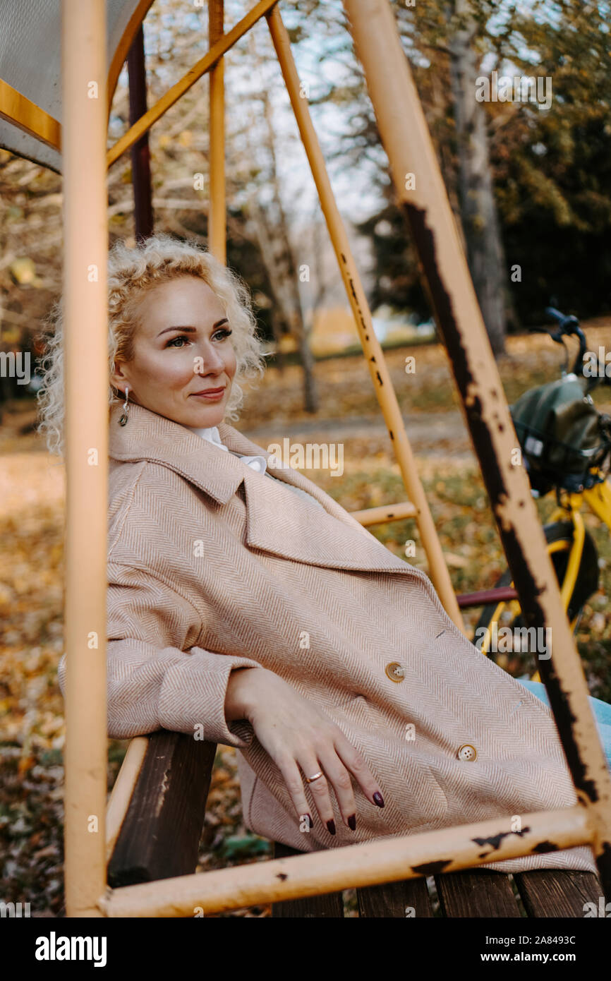 Older woman swinging hi-res stock photography and images - Alamy