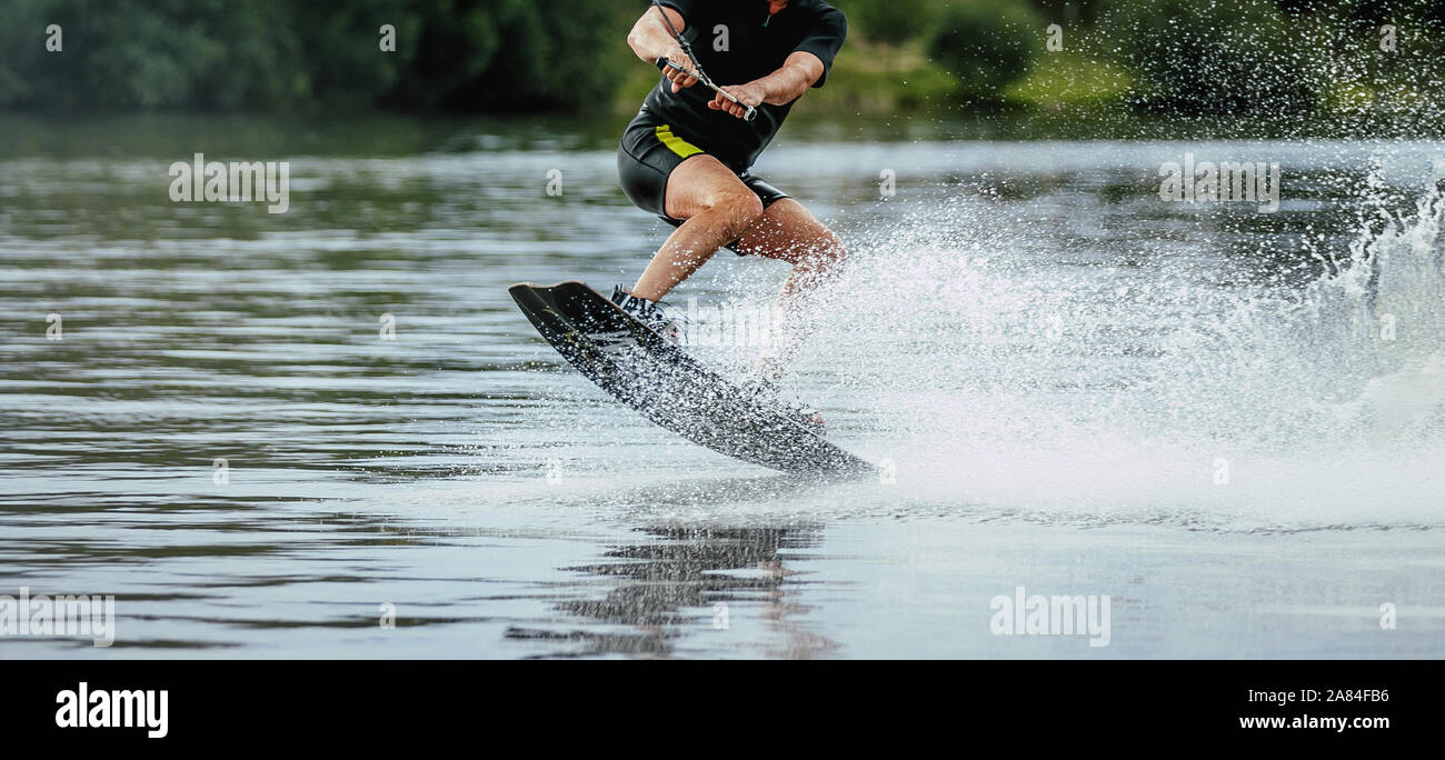 male wakeboard rider extreme sport wakeboarding Stock Photo