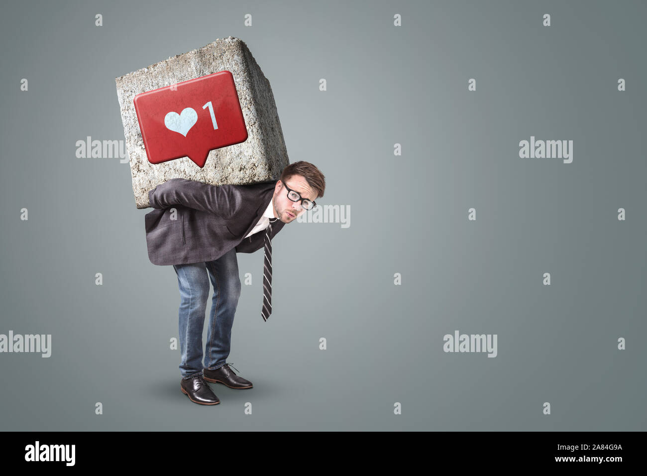 Man under pressure from social media Stock Photo