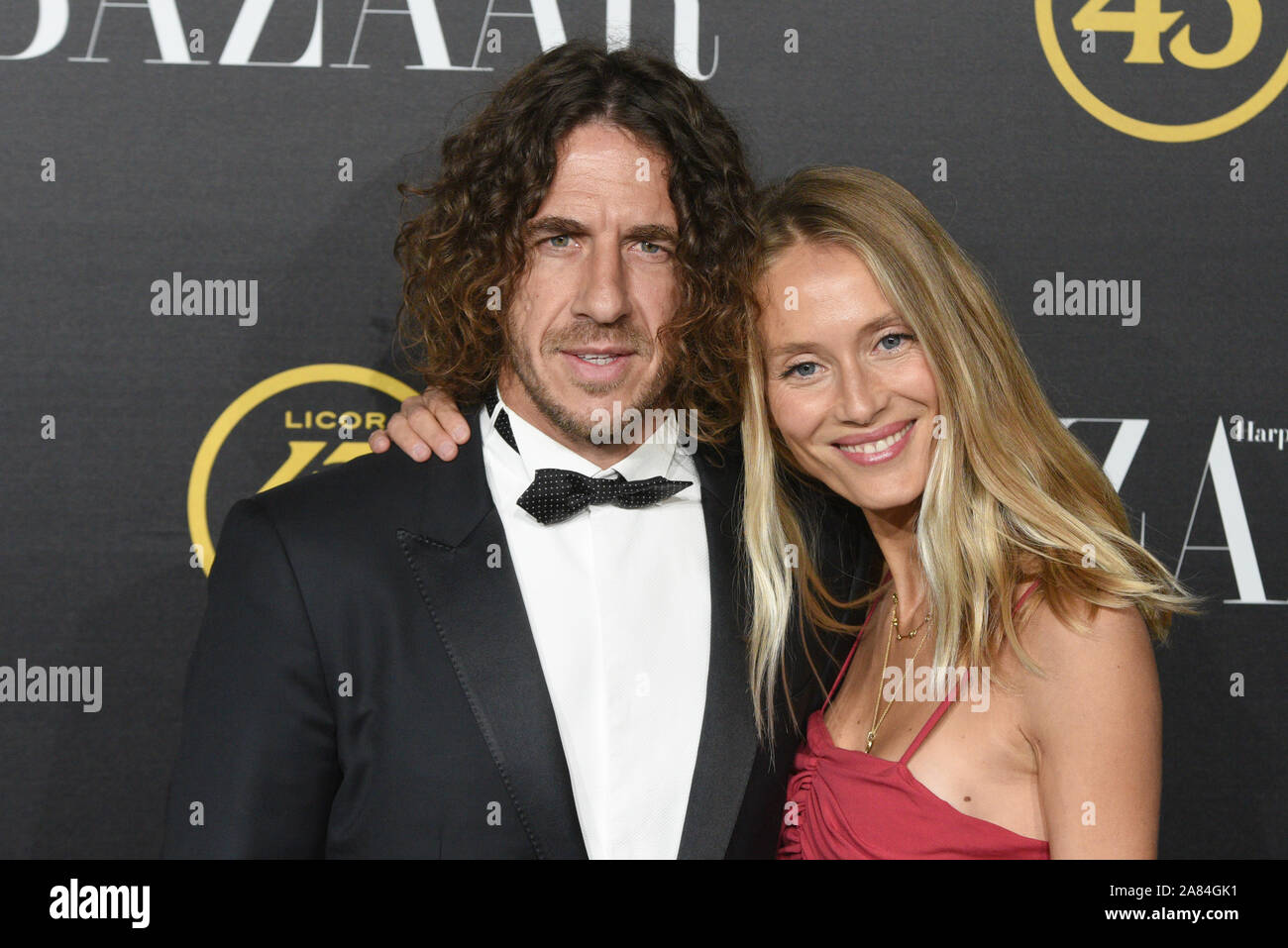 Carles Puyol (L) and Vanesa Lorenzo attend the Harper's Bazaar Awards at Santoña palace in Madrid. Stock Photo