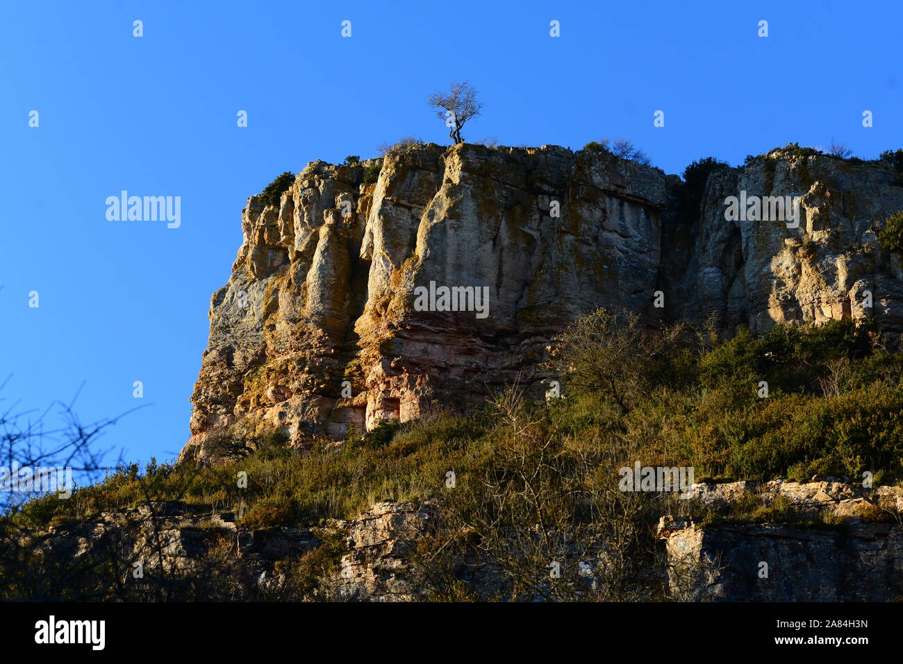 Impressive Prehistoric Rock Formation Roche de Solutre in Saone et Loire region in France Stock Photo