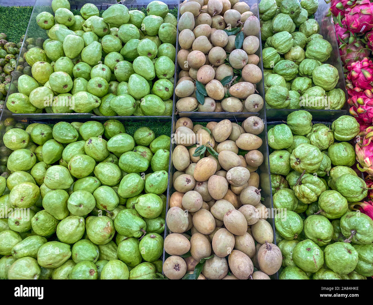 Assorted tropical fresh fruits for sale at hypermarket Stock Photo Alamy