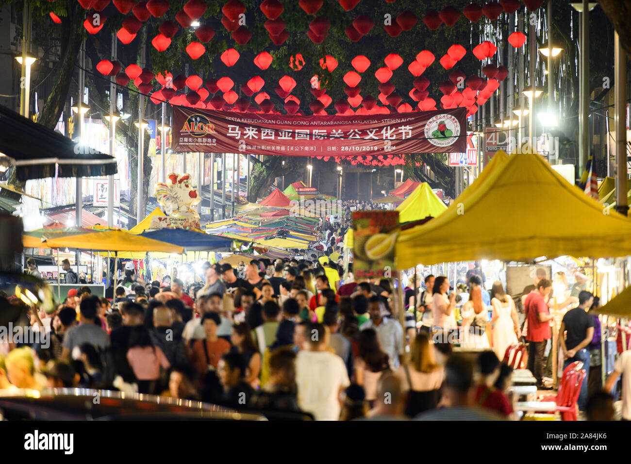 Crowd of people in Jalan Alor street in Kuala Lumpur. Jalan Alor is a famous food street in