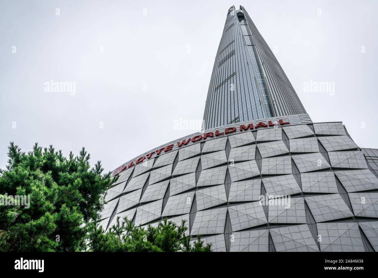 Seoul Korea , 20 September 2019 : Lotte tower mall sign and Lotte World Tower a supertall skyscraper in Seoul South Korea Stock Photo