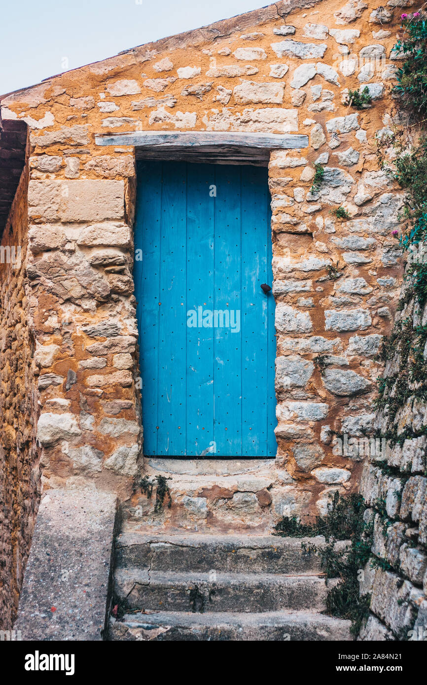 Ancient wooden door in a stone house Stock Photo - Alamy