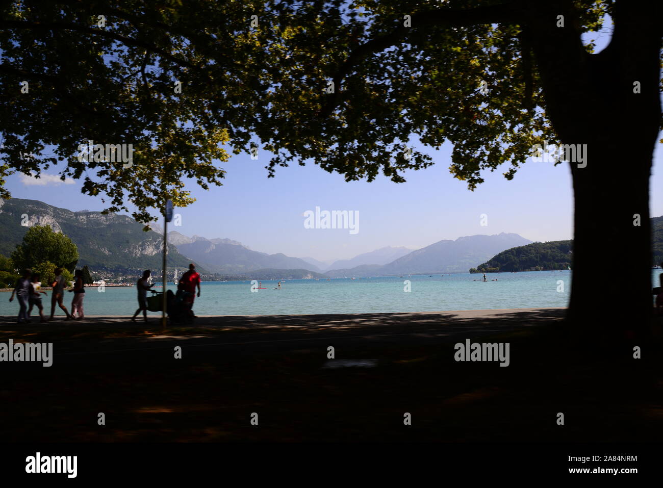 Annecy lake and town in summertime Stock Photo
