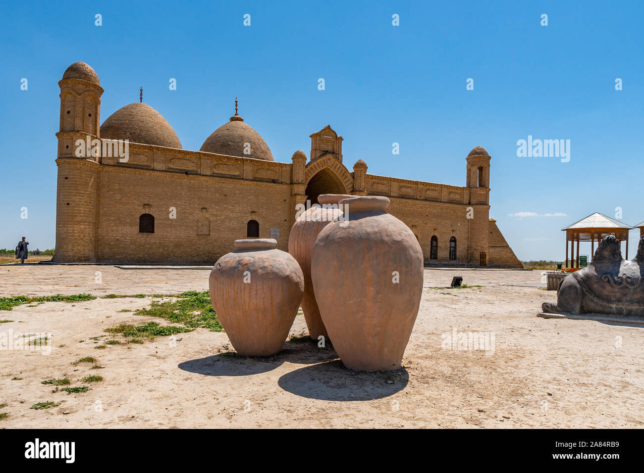 Turkestan Arystan Bab Mausoleum Breathtaking Picturesque View with Clay Pots on a Sunny Blue Sky Day Stock Photo