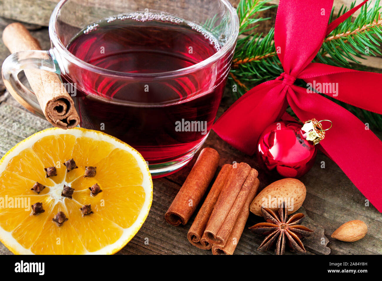 Hot spiced wine with cinnamon and oranges Stock Photo