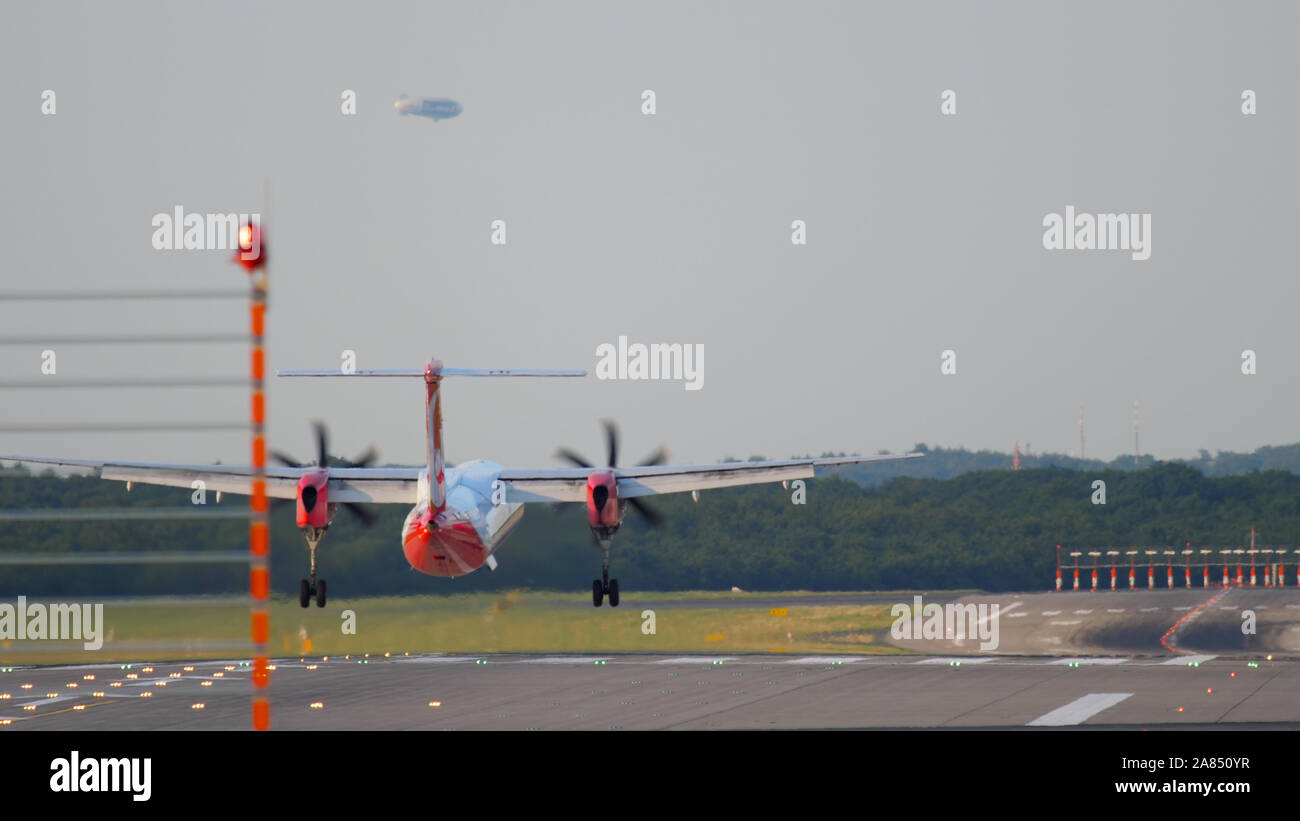 Turboprop Bombardier DASH 8 landing Stock Photo