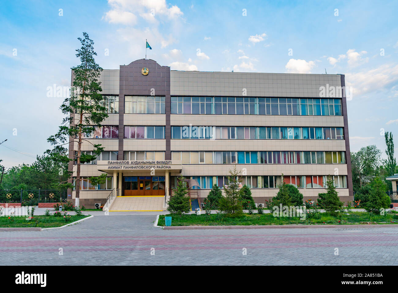Zharkent Akimat Panfilov Rayon City Hall Building Picturesque Breathtaking View on a Sunset Blue Sky Day Stock Photo