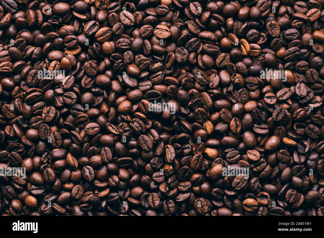 Pile of roasted coffee beans Stock Photo - Alamy