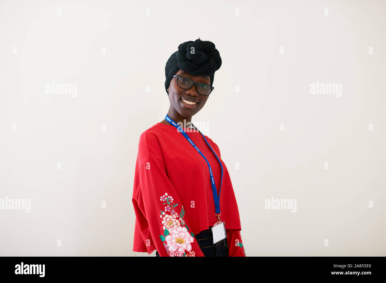 Portrait confident young woman wearing dhuku headscarf Stock Photo