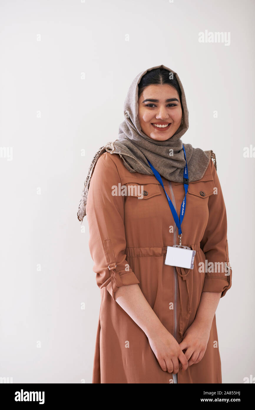 Portrait confident teenage girl wearing hijab Stock Photo