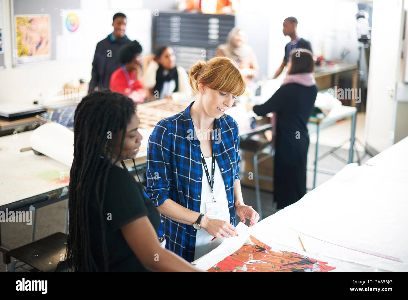 Female art students working in art studio Stock Photo