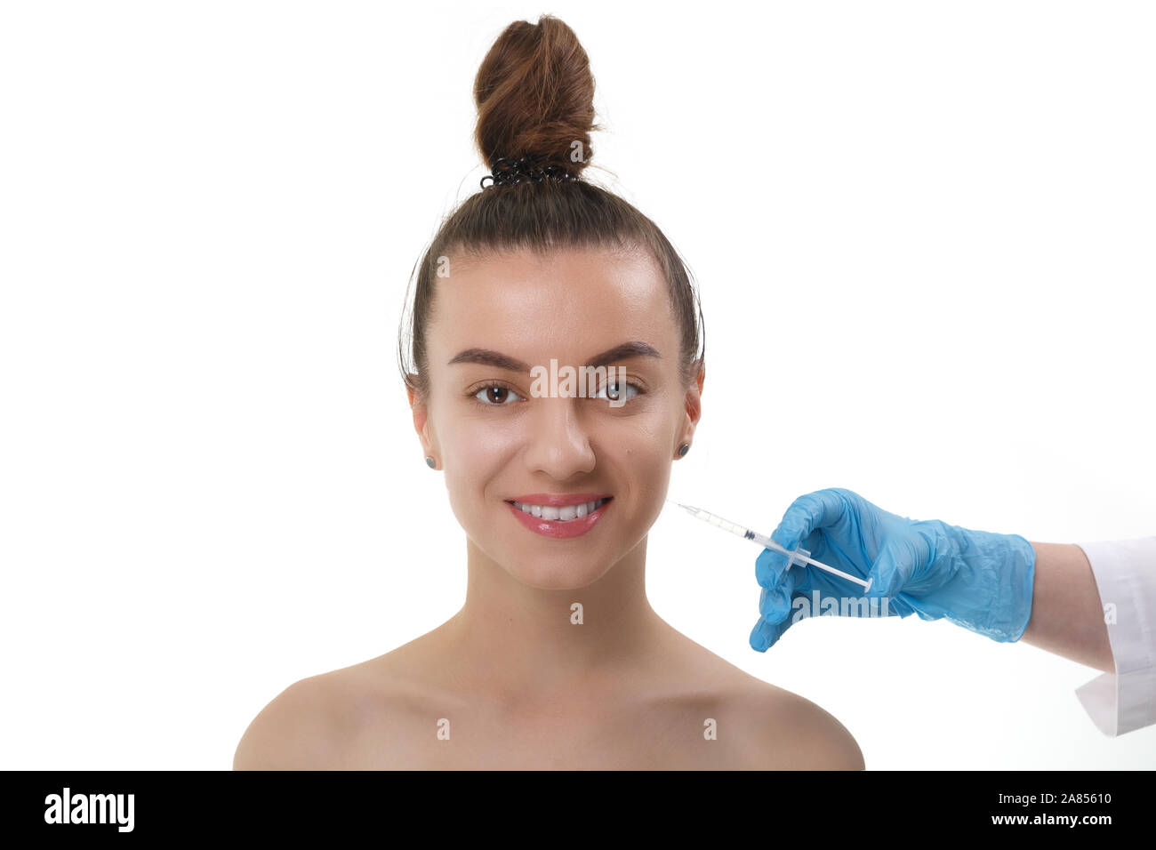 Facial Beauty Injections. Portrait Beautiful Young Woman Receiving Hyaluronic Acid Injection