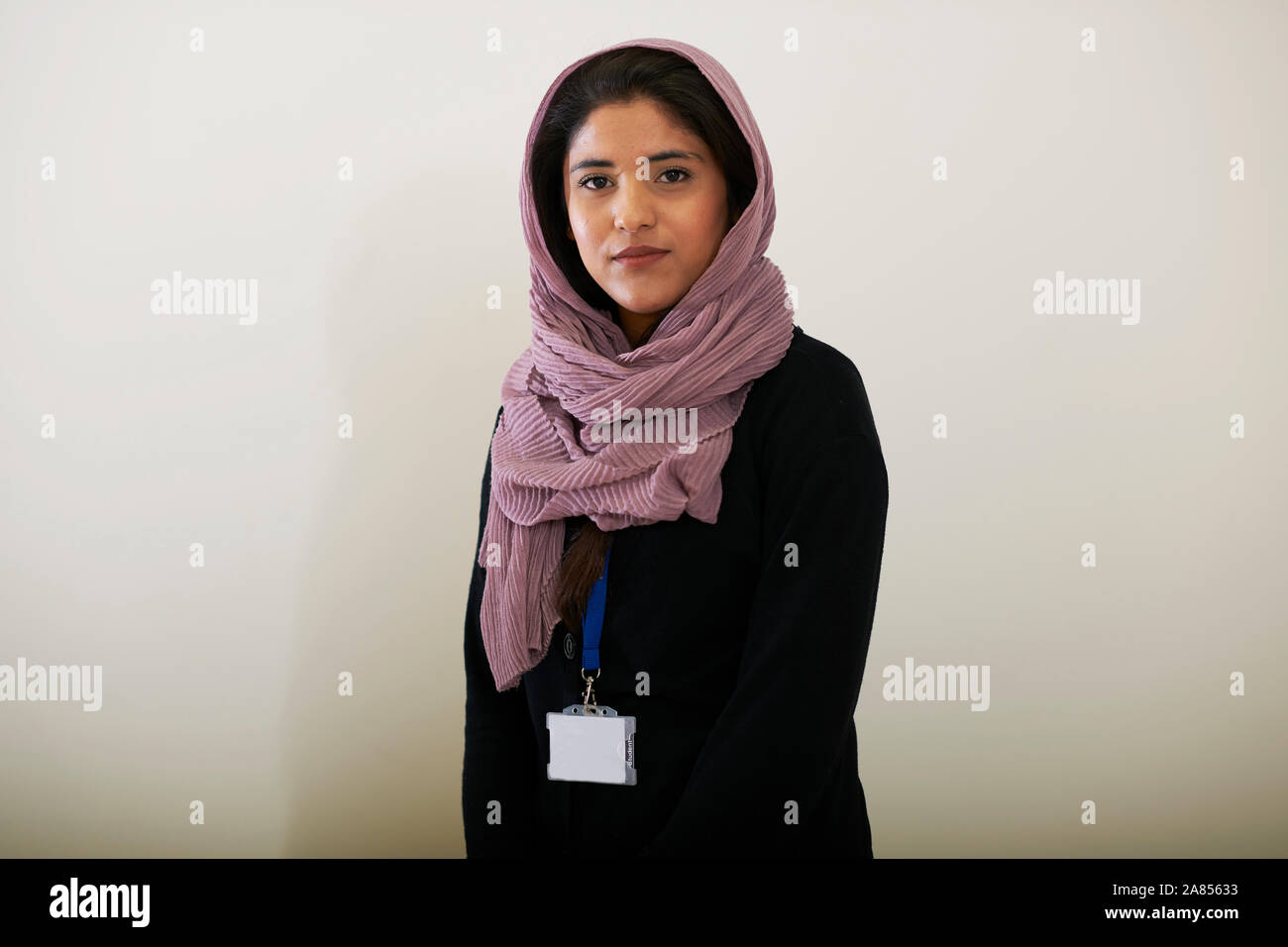 Portrait confident young woman wearing hijab Stock Photo