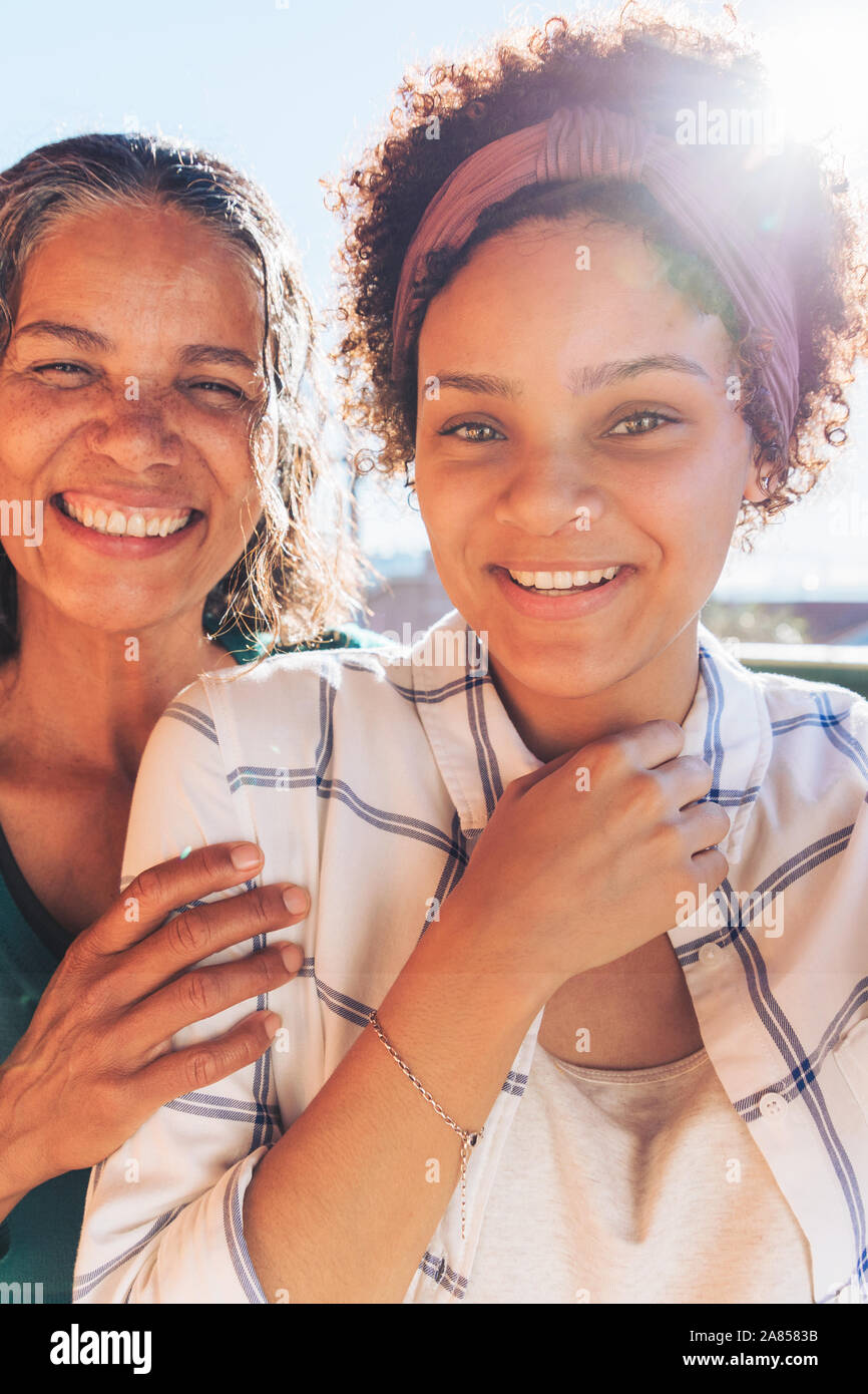Portrait smiling, confident mother and daughter Stock Photo