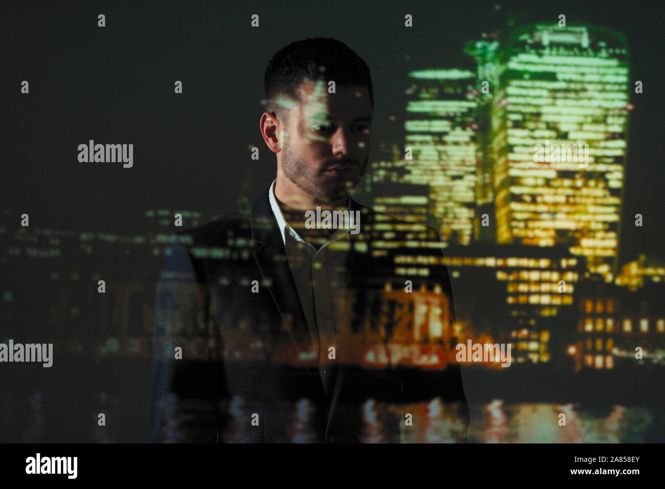 Double exposure businessman and cityscape at night Stock Photo
