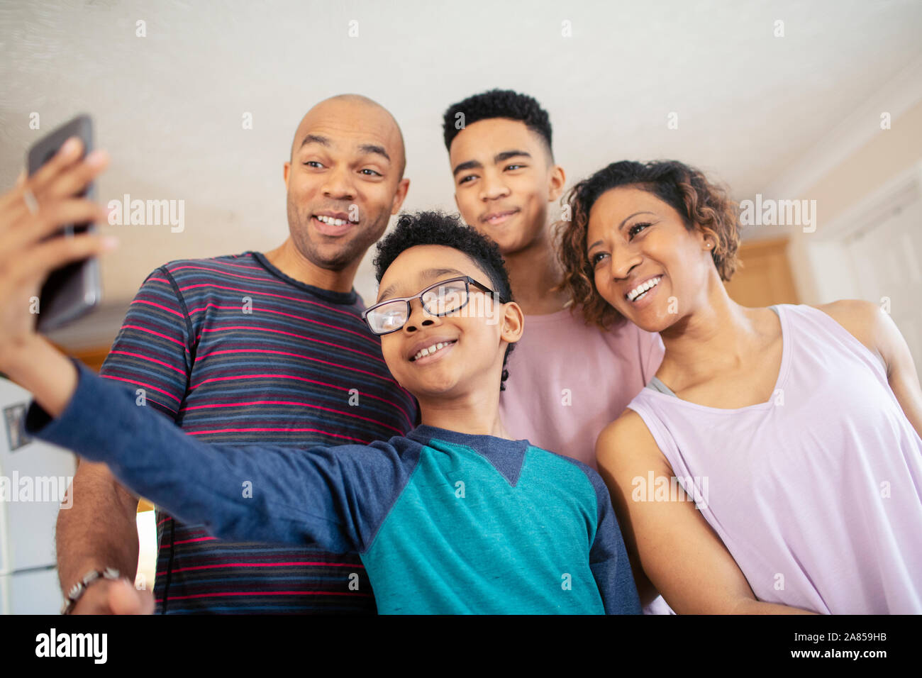 Smiling family taking selfie Stock Photo