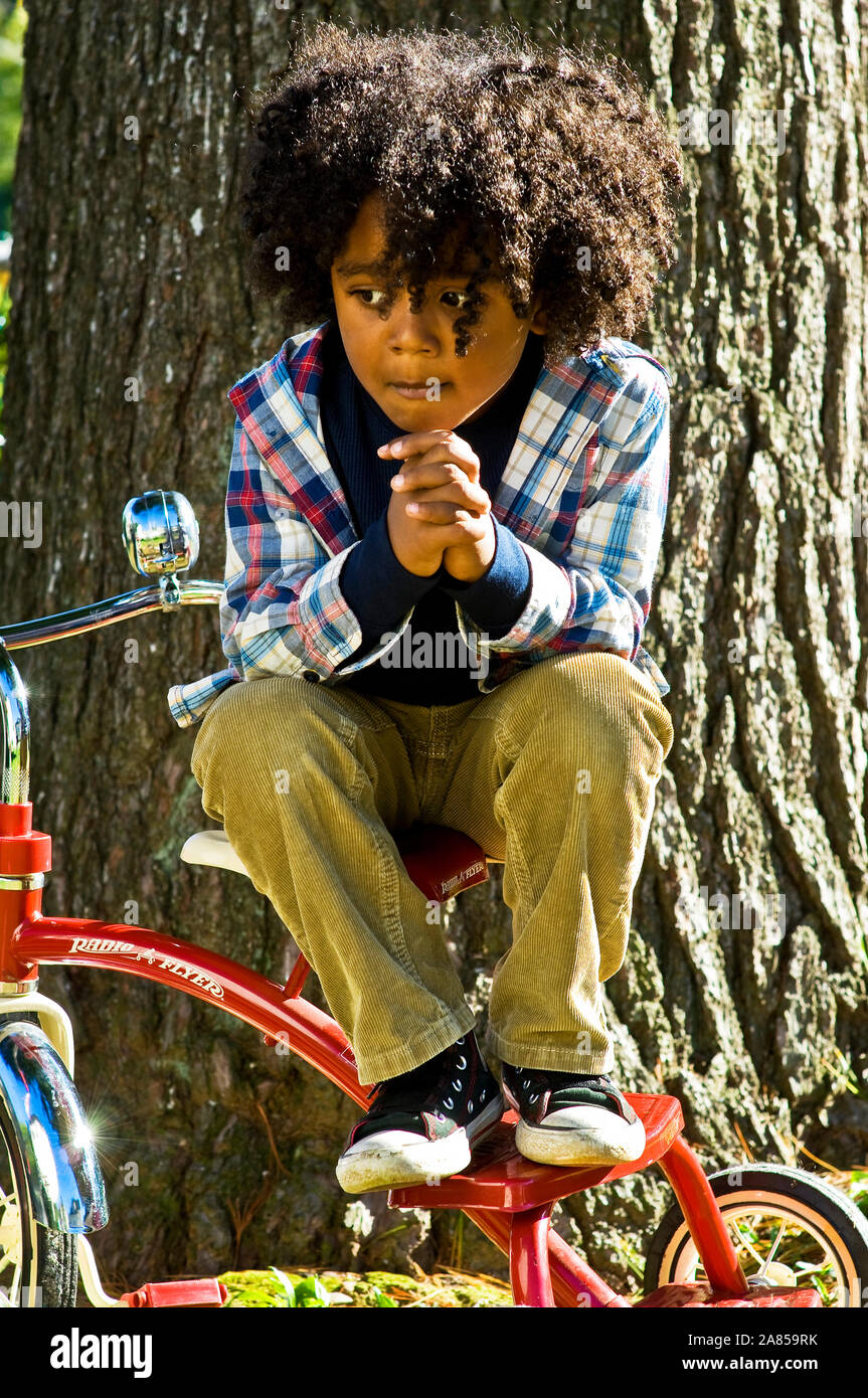 Little Boy On Tricycle Stock Photo Alamy