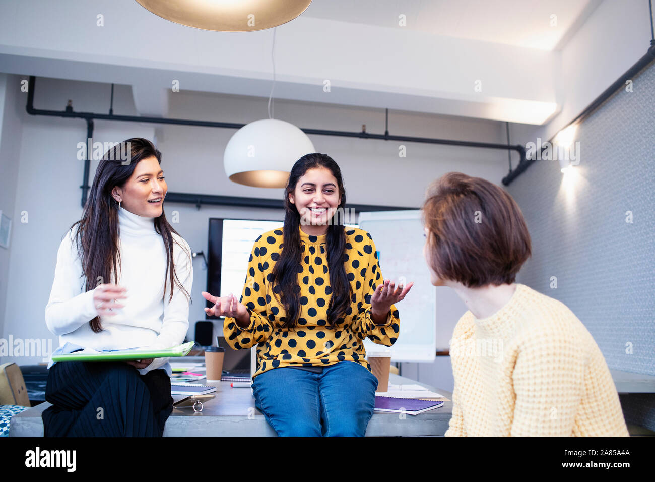 Businesswomen talking in conference room meeting Stock Photo - Alamy