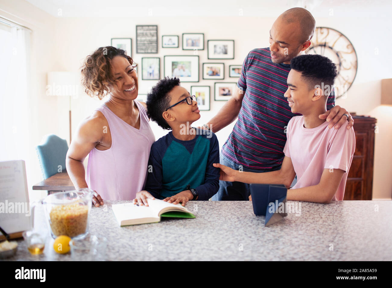 Family bonding in kitchen Stock Photo