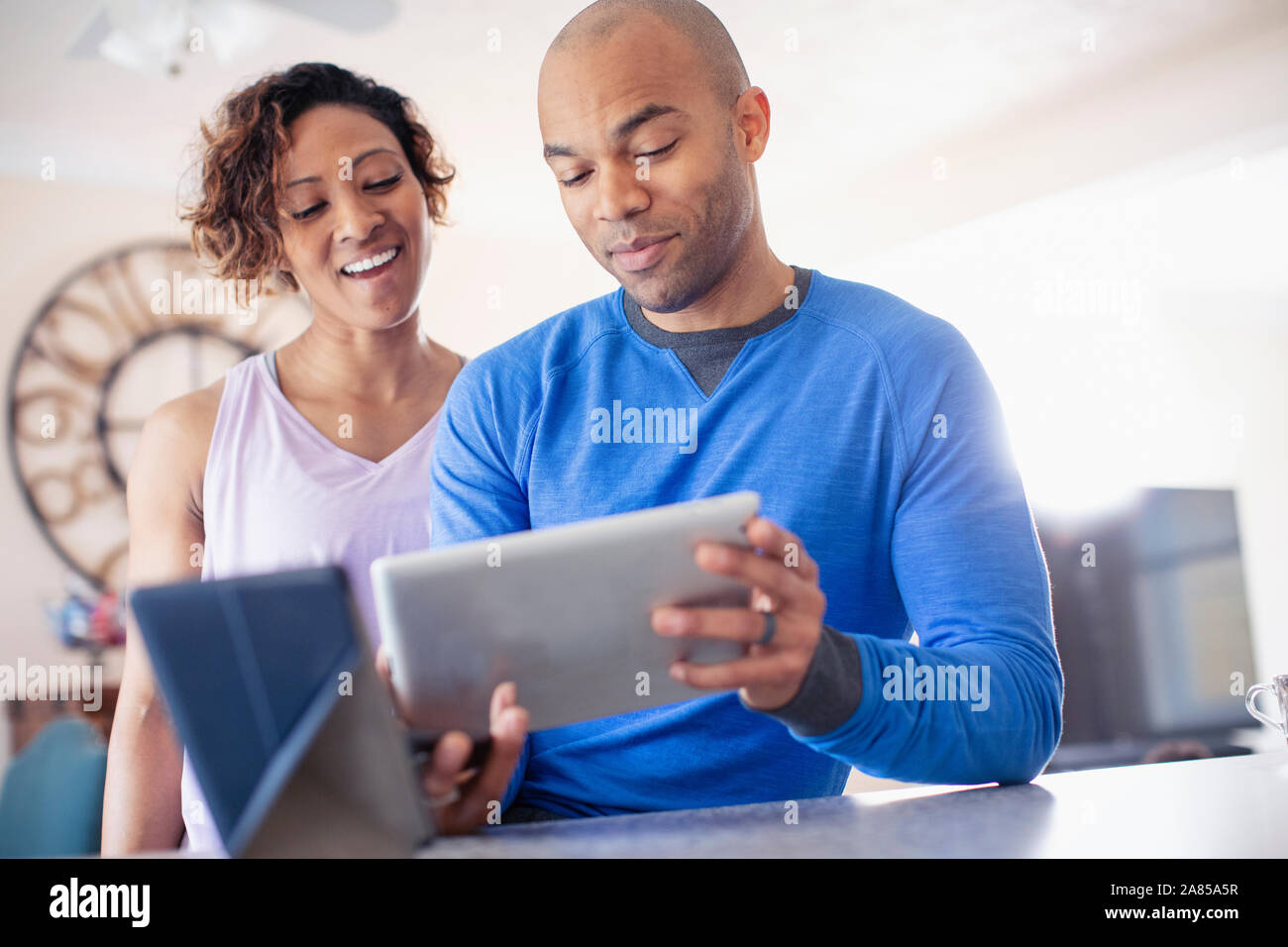 Couple using digital tablet Stock Photo