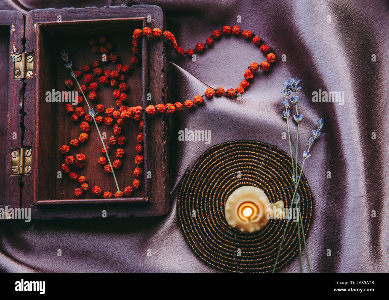 Necklace Made Of Dried Rowan Berries Folklore Protection Spell Charm Concept Beeswax Candle Burning And Chain Hanging Out Of Brown Wood Decorative Stock Photo Alamy