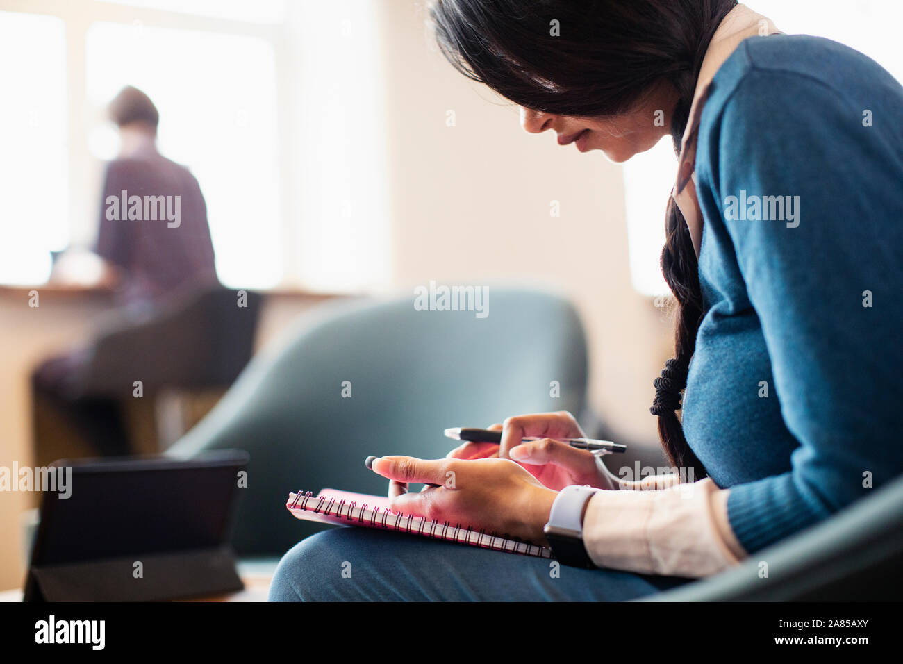 Businesswoman using smart phone Stock Photo