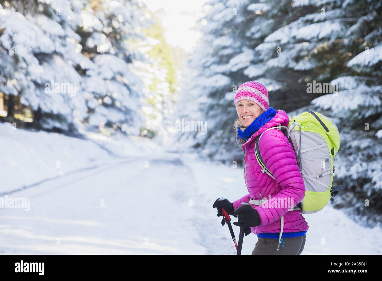 Mature woman hiking on trail hi-res stock photography and images - Alamy