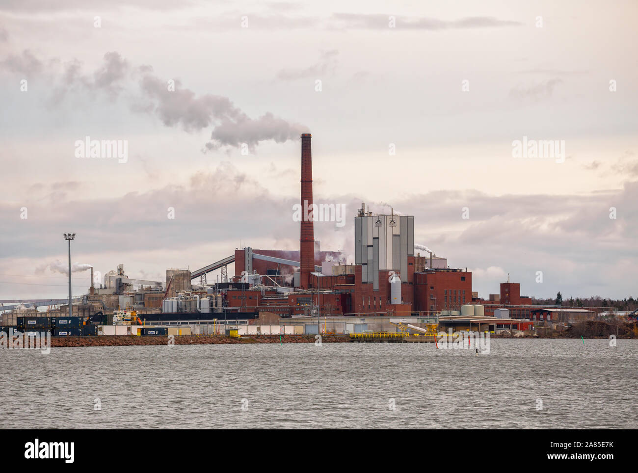 KOTKA, FINLAND - NOVEMBER 02, 2019: Sunila pulp and paper mill of Stora Enso Oyj corporation on shore of Gulf of Finland. Red brick industrial buildin Stock Photo