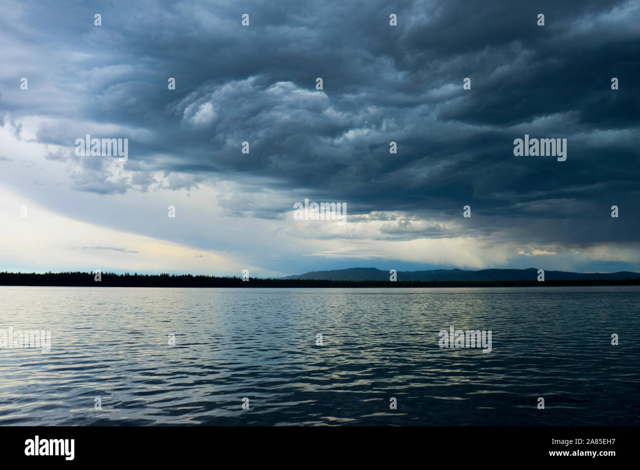 Ominous dark sky of storm clouds over Jenny Lake Stock Photo