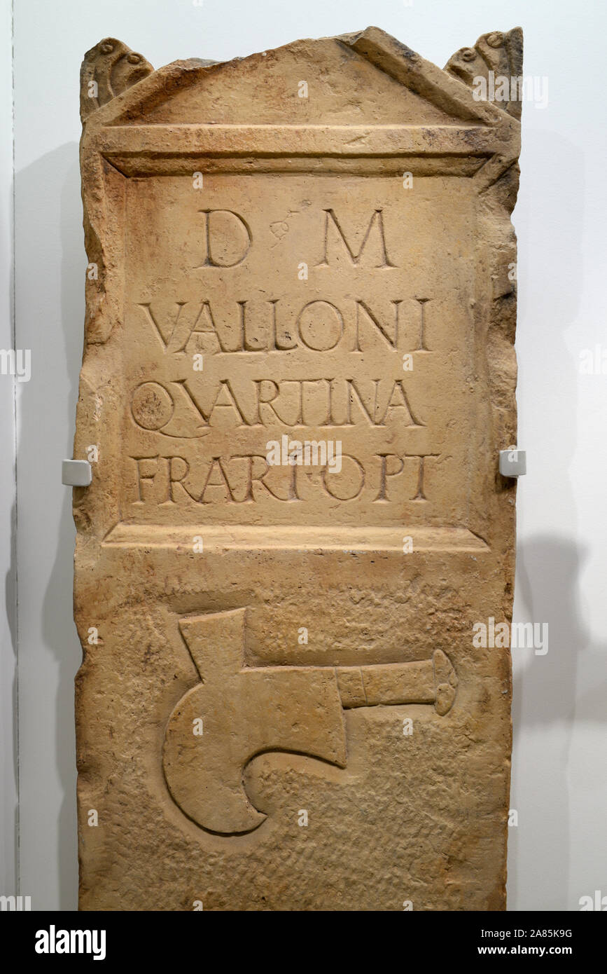 Roman Winegrower (named as Vallo) Tomb 1-2nd AD & Winegrower's Sickle Tool Musée de la Romanité Nimes France Stock Photo