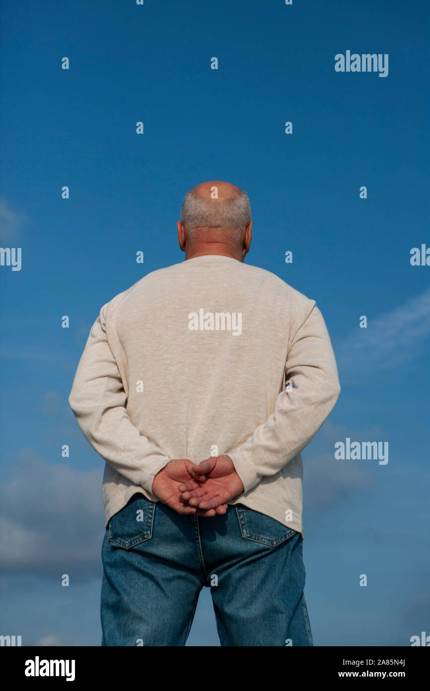 Senior man looking out Stock Photo